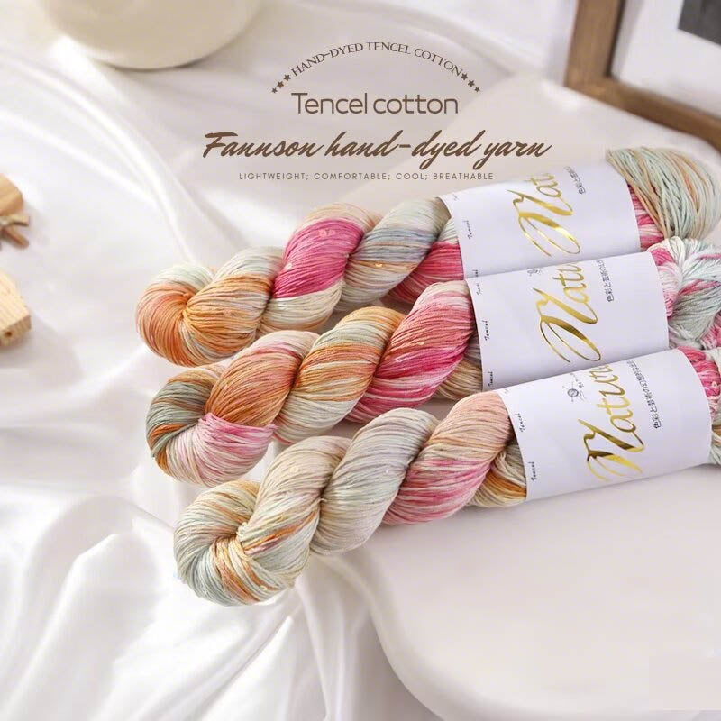 Orange ombre hand-dyed yarn skeins