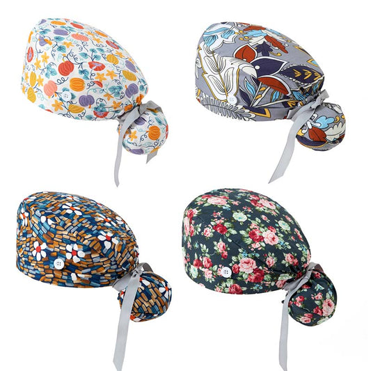 Four colorful ponytail scrub caps with unique patterns and gray ribbons